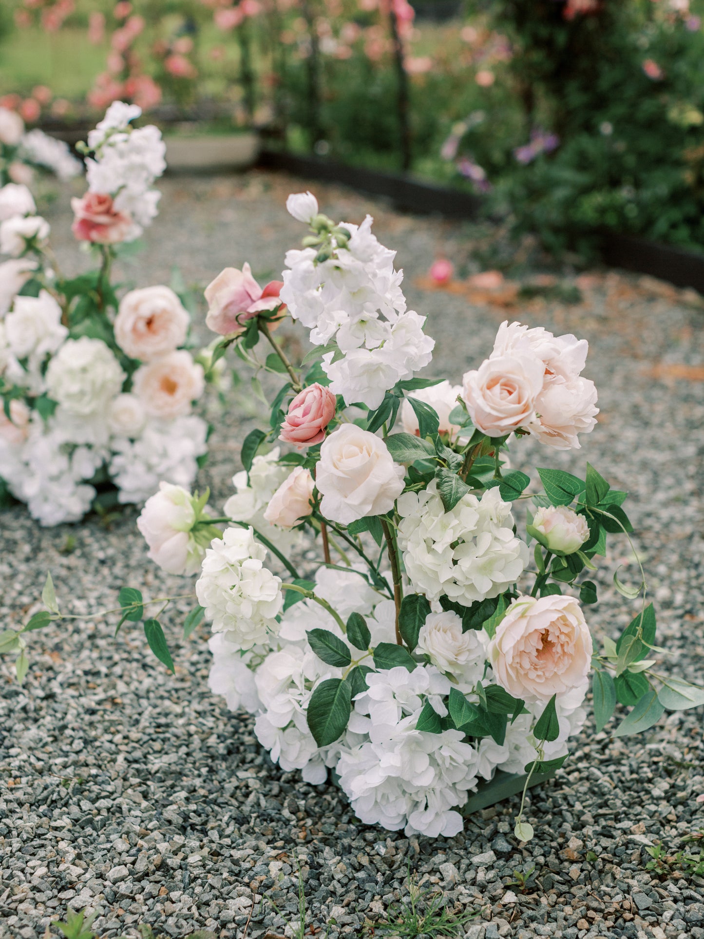 Blush Aisle Flowers at Wedding